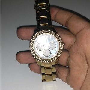 Gold fossil watch